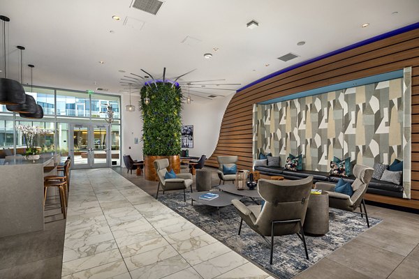Clubhouse with modern decor at The Current Apartments featuring luxury amenities