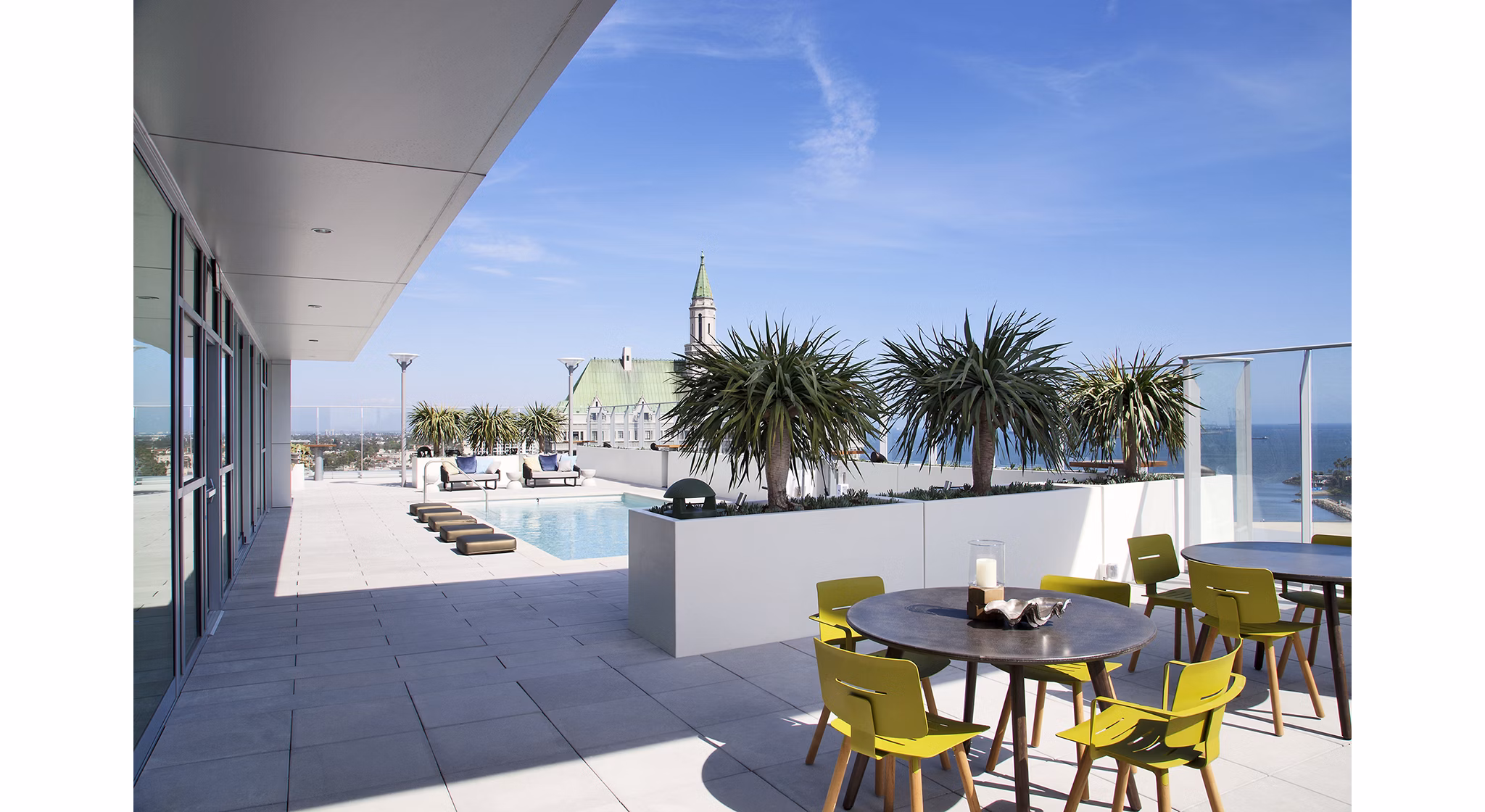 Patio with comfortable seating at The Current Apartments offering luxury outdoor living spaces