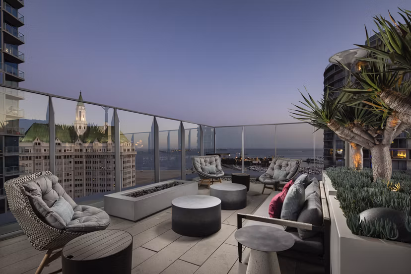 Cozy fire pit at The Current Apartments offering communal gatherings in a modern outdoor space