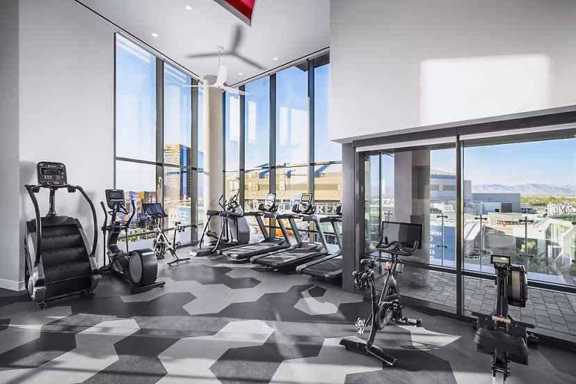 Fitness center with state-of-the-art equipment at The Ryan Apartments, offering a luxurious workout experience