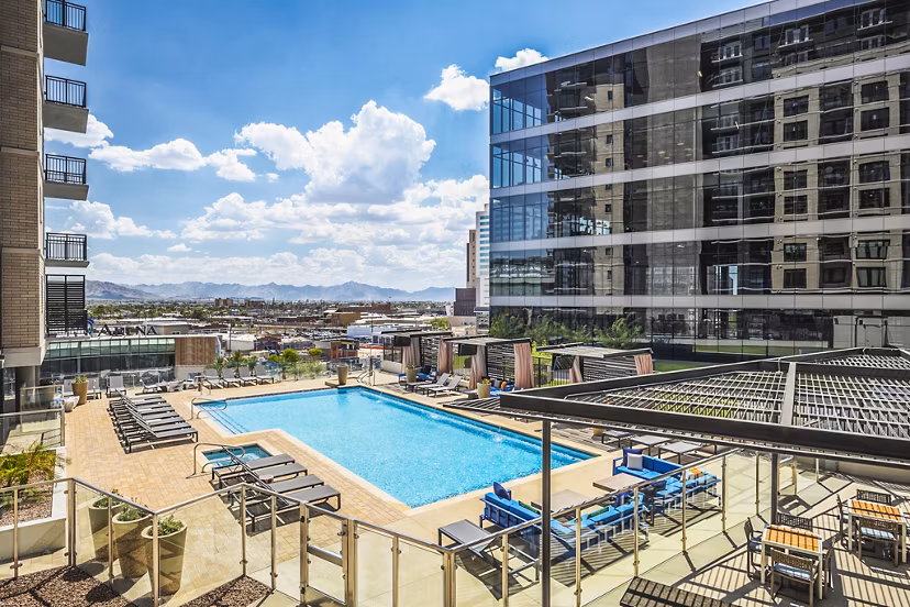 Rooftop pool with skyline views at The Ryan Apartments luxury residence