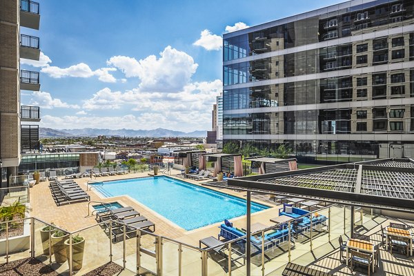 Rooftop pool with skyline views at The Ryan Apartments luxury residence