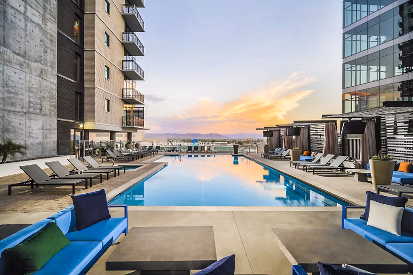 Luxurious rooftop pool with city views at The Ryan Apartments, ideal for relaxation and leisure in an urban setting