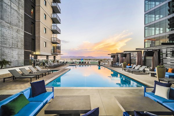 Luxurious rooftop pool with city views at The Ryan Apartments, ideal for relaxation and leisure in an urban setting