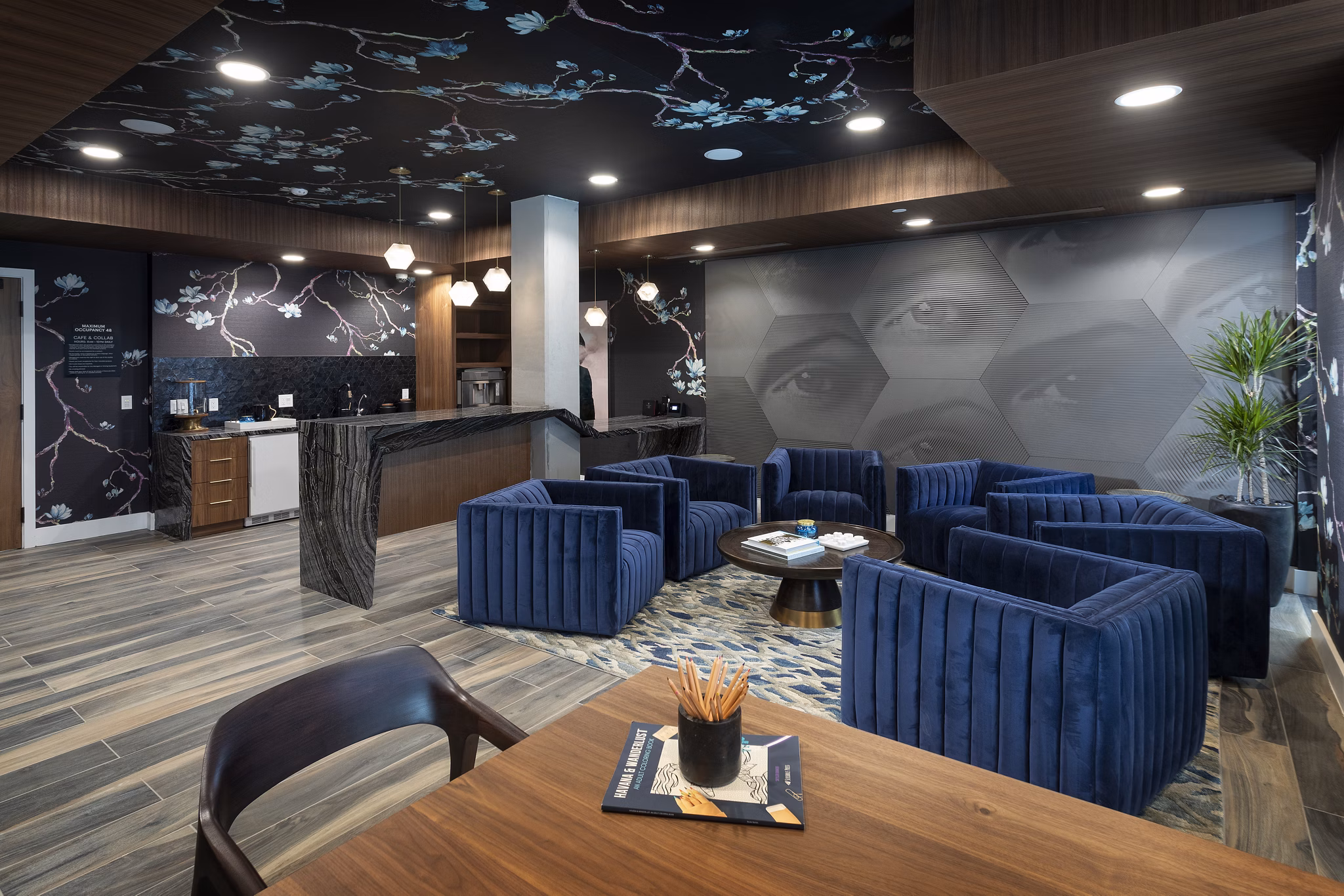 Elegant clubhouse with modern furnishings at Broadstone Arden Apartments, perfect for social gatherings and community events