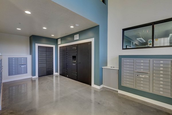 Mail room with organized package lockers at The Zeller Apartments, a Greystar luxury community