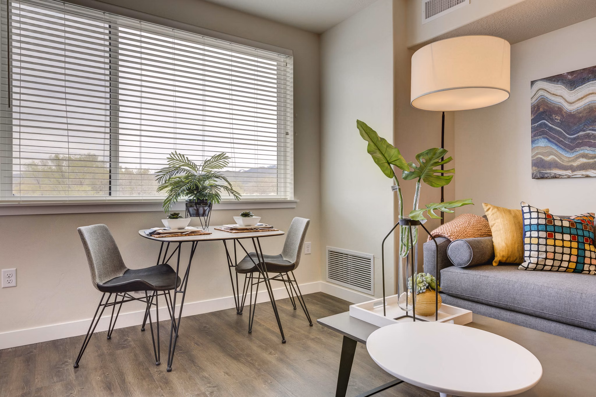 Dining area with elegant modern furniture at The Zeller Apartments, offering a luxury living experience for residents