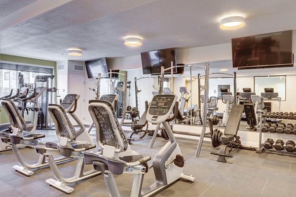 Fitness center with modern equipment at The Zeller Apartments offering a premium workout experience for residents