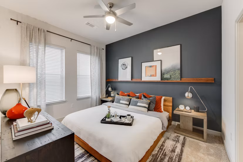 Bedroom with modern decor featuring elegant furnishings at The Silverlake Apartments