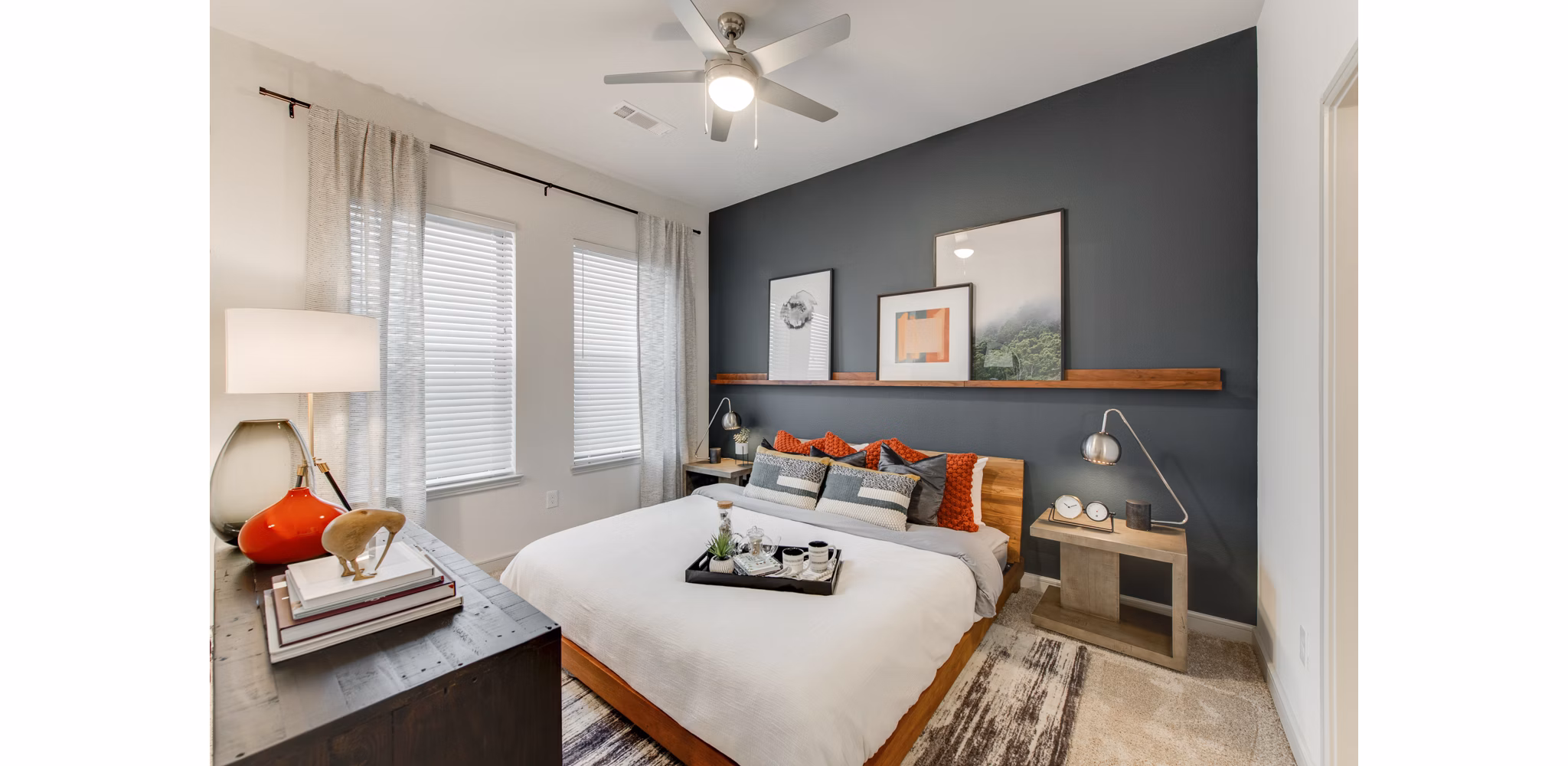Bedroom with modern decor featuring elegant furnishings at The Silverlake Apartments