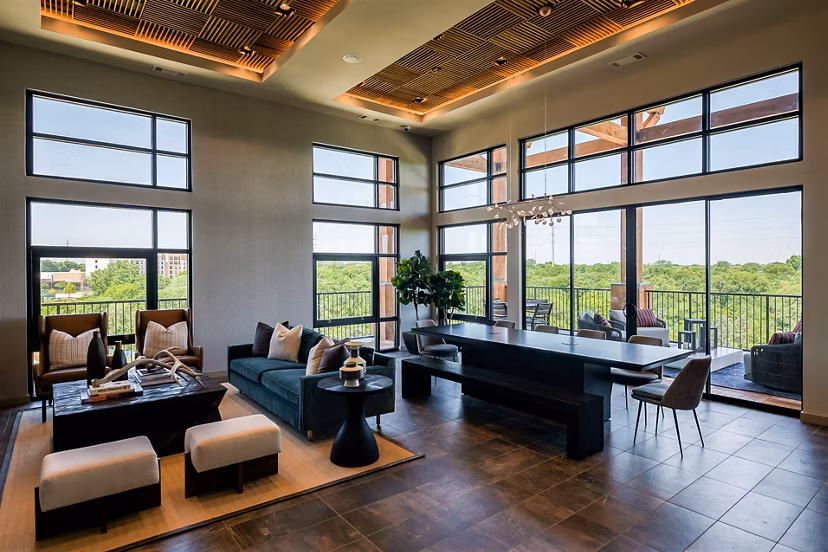 Stylish clubhouse with modern decor at The Silverlake Apartments, accommodating social gatherings and community events