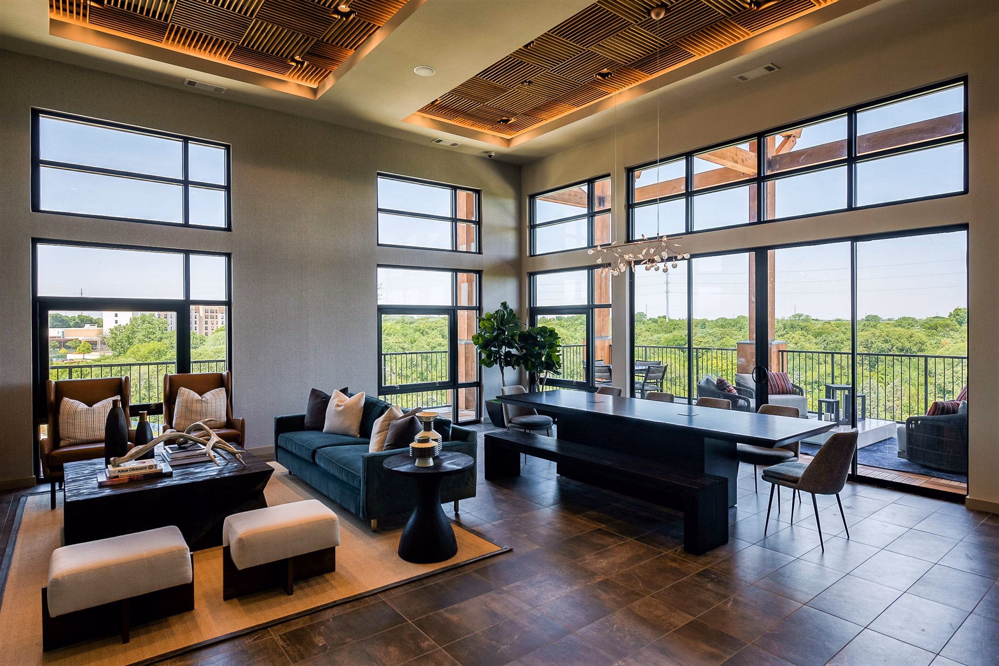 Stylish clubhouse with modern decor at The Silverlake Apartments, accommodating social gatherings and community events