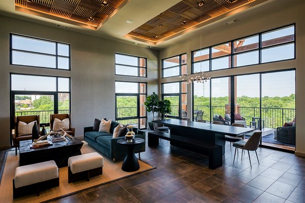 Stylish clubhouse with modern decor at The Silverlake Apartments, accommodating social gatherings and community events