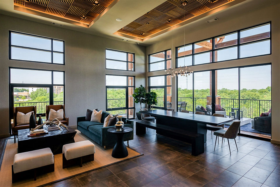 Stylish clubhouse with modern decor at The Silverlake Apartments, accommodating social gatherings and community events
