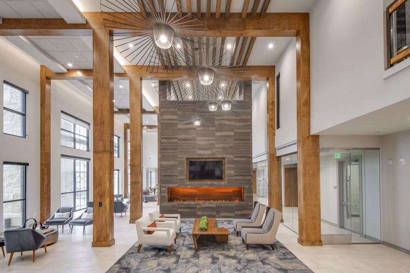 Elegant clubhouse featuring modern decor and ample seating at The Silverlake Apartments offering luxury living options