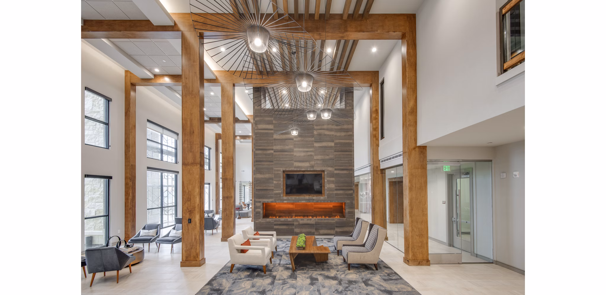 Elegant clubhouse featuring modern decor and ample seating at The Silverlake Apartments offering luxury living options