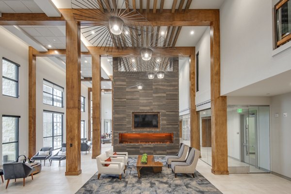 Elegant clubhouse featuring modern decor and ample seating at The Silverlake Apartments offering luxury living options