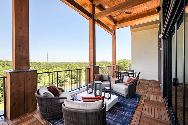 Cozy outdoor patio with modern furniture at The Silverlake Apartments