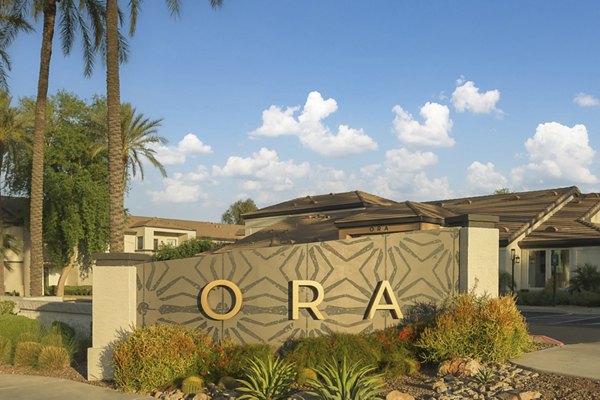 ORA Apartments: Modern architectural signage at luxury property
