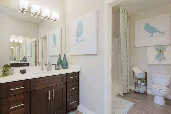 Modern bathroom with elegant fixtures at ORA Apartments, showcasing luxury living