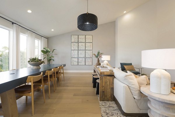 Modern clubhouse with stylish seating and open-plan design at ORA Apartments, a luxury Greystar property in prime location