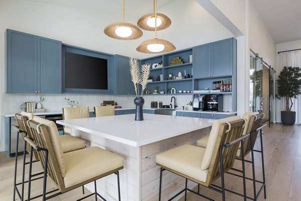 ORA Apartments: Modern clubhouse with stylish design elements in the heart of the community