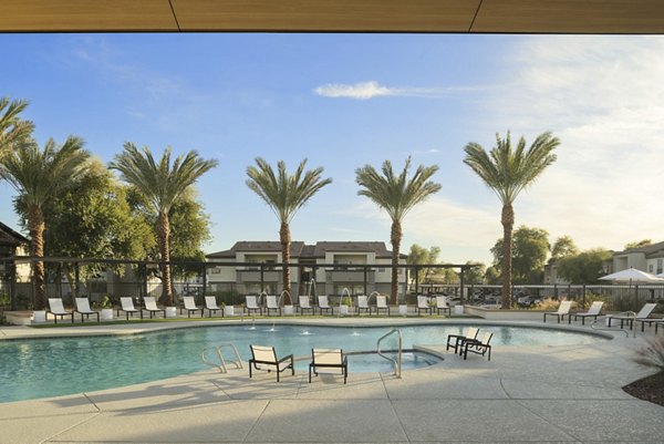 Luxurious infinity pool at ORA Apartments offering stunning views