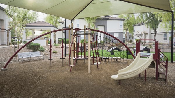 Modern playground with safe equipment at ORA Apartments, a luxury Greystar community perfect for families and kids' activities