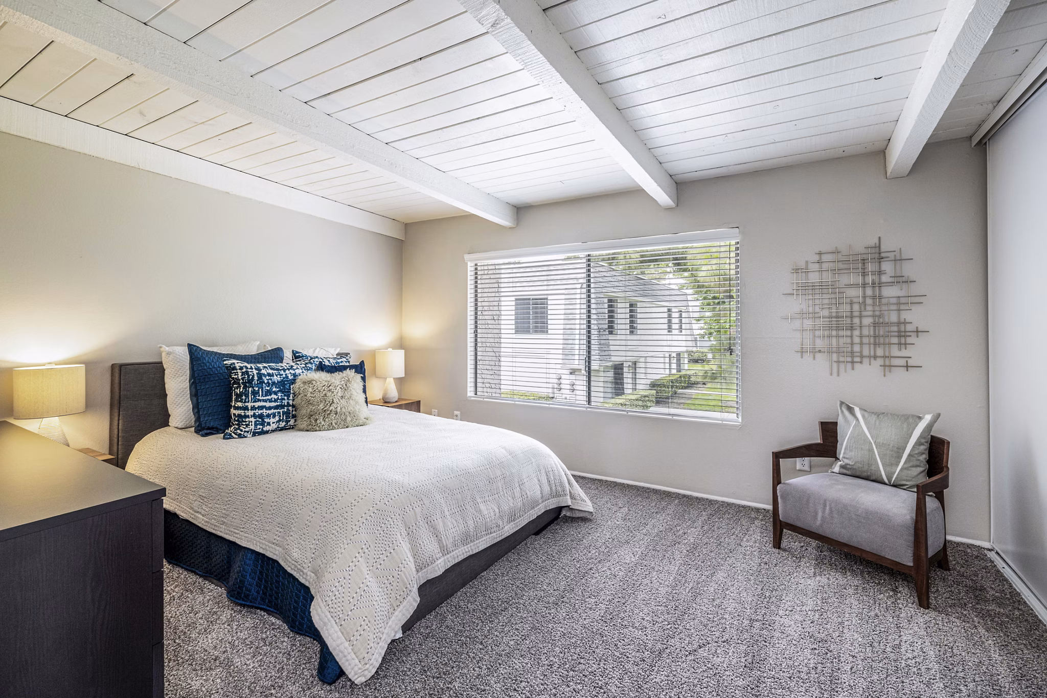 Bedroom featuring elegant finishes at Lexington Townhomes Apartments