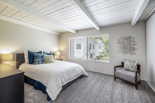 Bedroom featuring elegant finishes at Lexington Townhomes Apartments