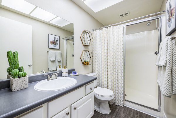 Bathroom with modern fixtures and subway tiles in Lexington Townhomes Apartments