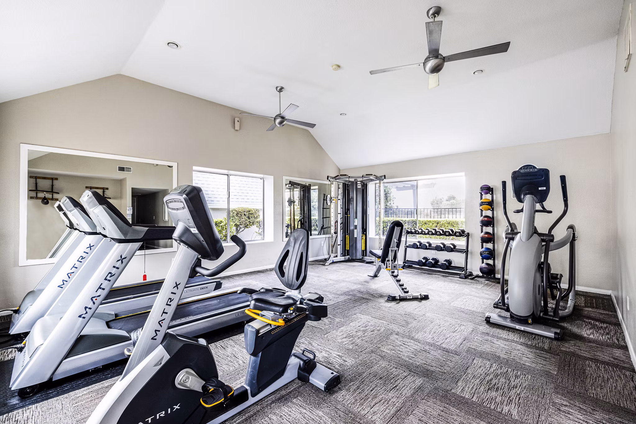 Modern fitness center with state-of-the-art equipment at Lexington Townhomes Apartments