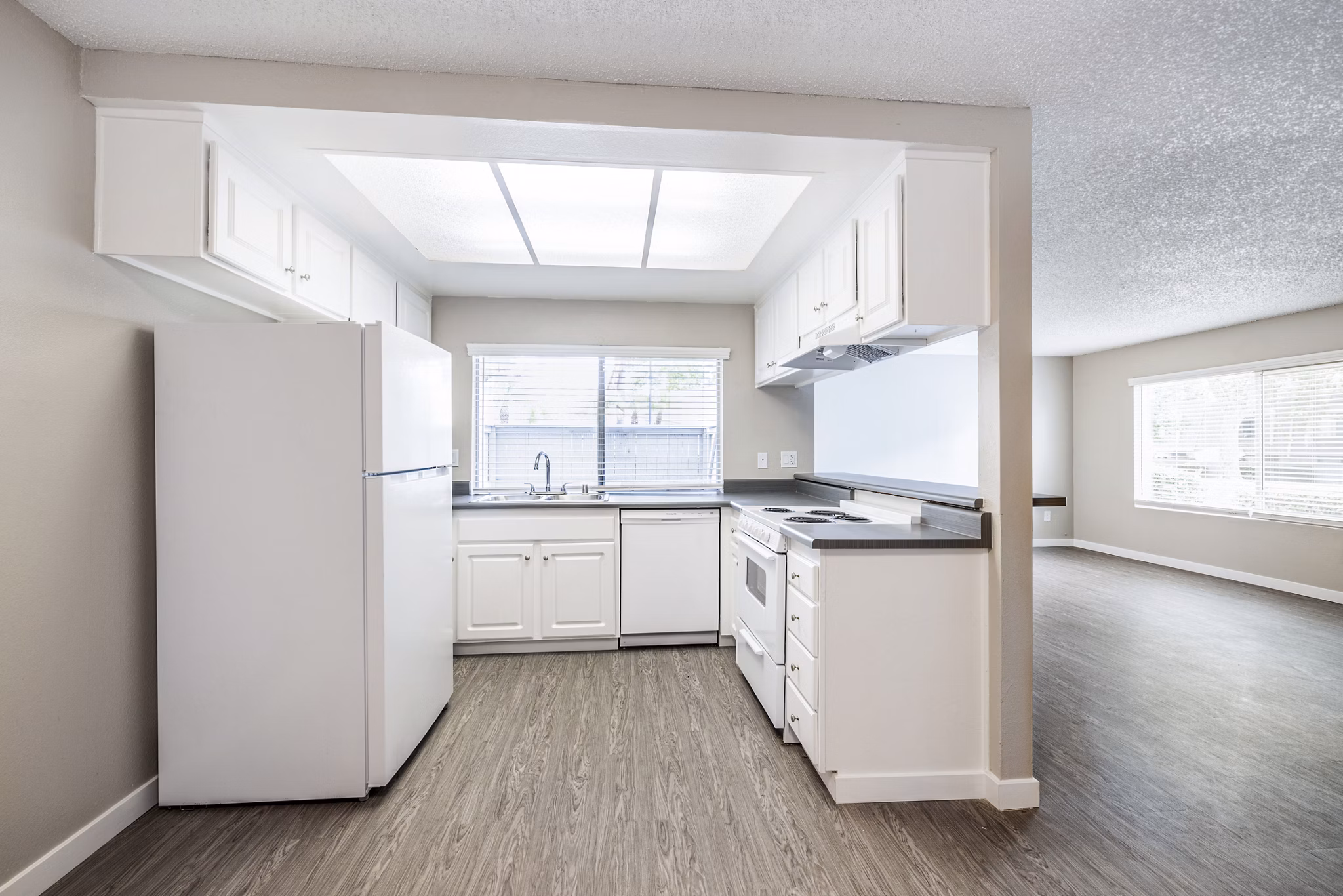 Modern kitchen with stainless steel appliances at Lexington Townhomes Apartments