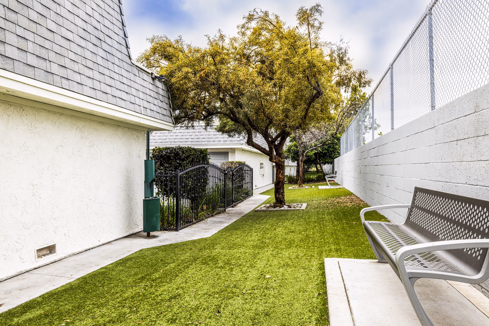 Dog park with agility course at Lexington Townhomes Apartments, ideal for pet-friendly living and leisure activities