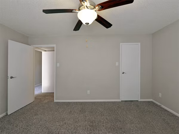 Cozy bedroom with contemporary decor at Scotland Yard Apartments