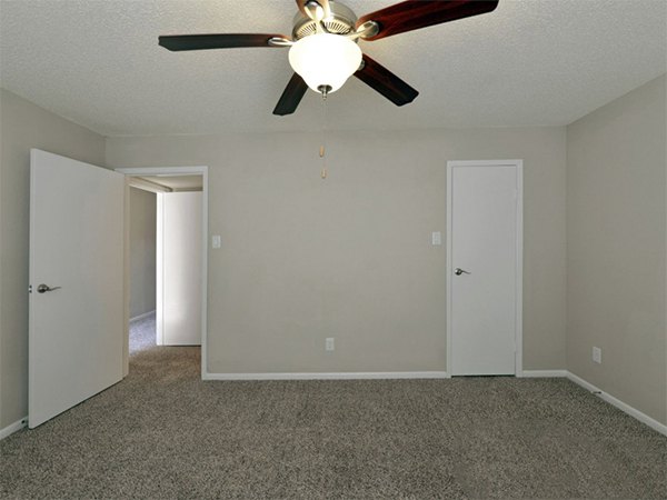 Cozy bedroom with contemporary decor at Scotland Yard Apartments