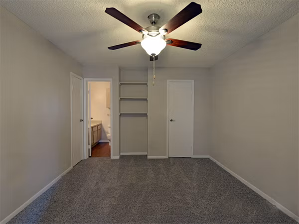 Cozy bedroom featuring modern decor at Scotland Yard Apartments