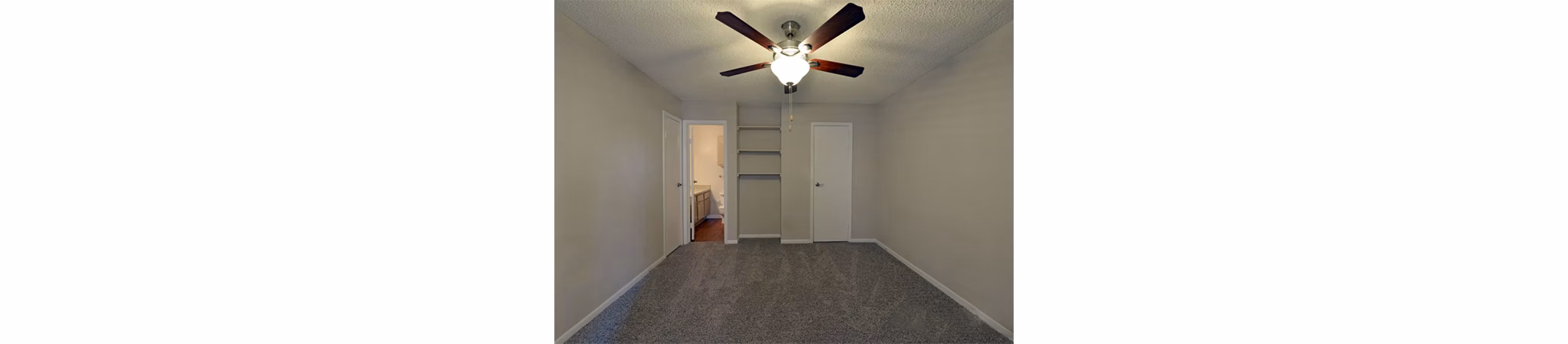 Cozy bedroom featuring modern decor at Scotland Yard Apartments