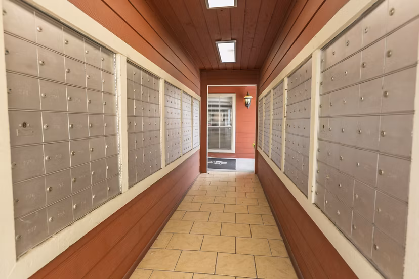 Mailroom with secure parcel lockers at Scotland Yard Apartments