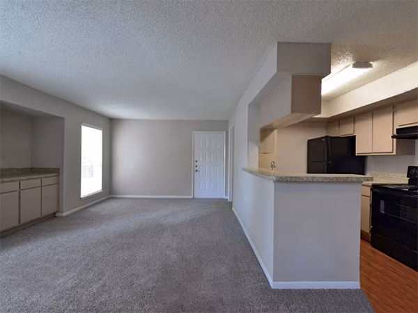 Living room featuring contemporary design and natural light at Scotland Yard Apartments luxury apartments