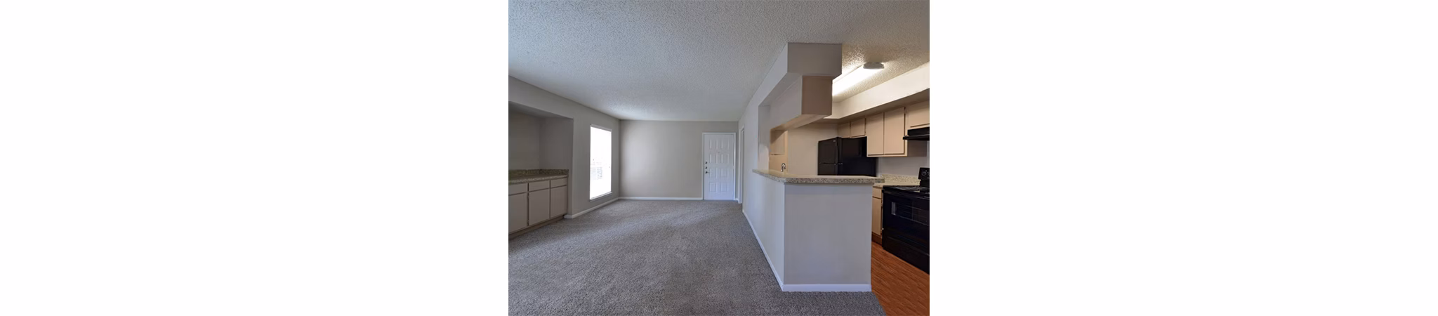 Living room featuring contemporary design and natural light at Scotland Yard Apartments luxury apartments