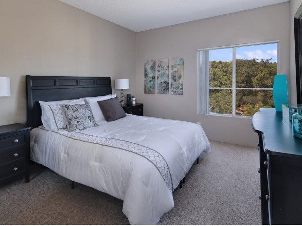 Cozy bedroom with elegant furnishings at Canyon Crest Apartments, Greystar luxury apartments in serene neighborhood