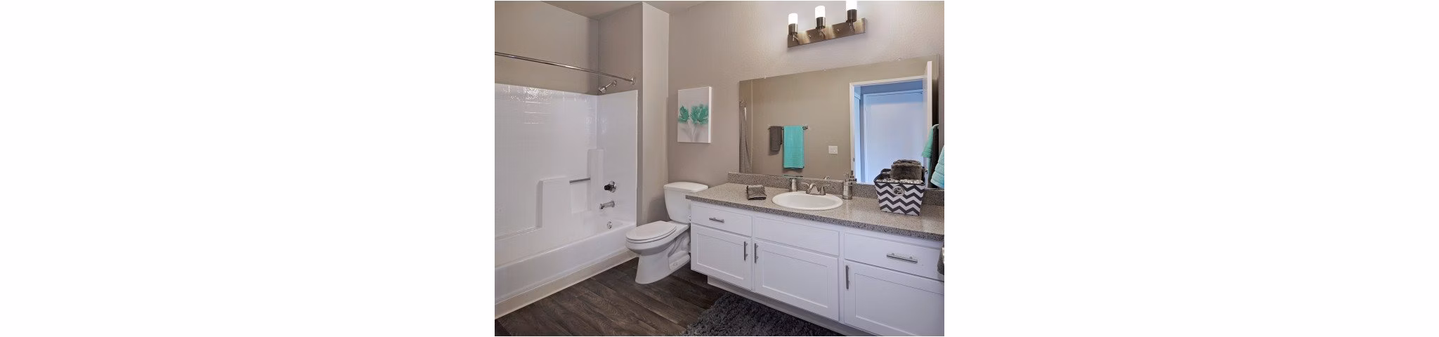 Elegant bathroom with granite countertops and modern fixtures at Canyon Crest Apartments