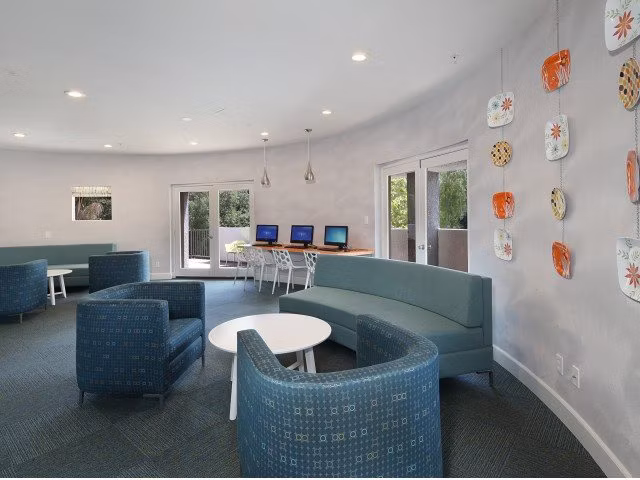 Clubhouse with modern furnishings at Canyon Crest Apartments, a luxury community offering exclusive amenities and stylish living spaces