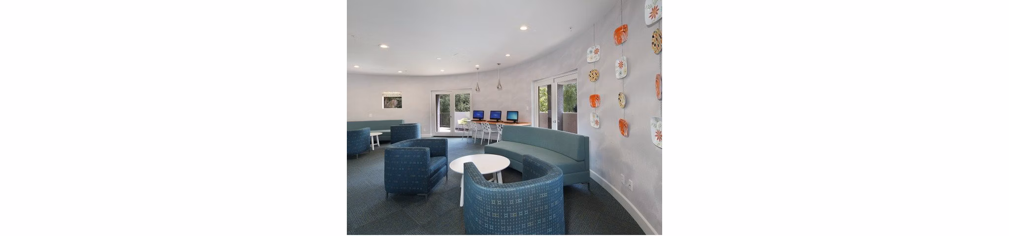 Clubhouse with modern furnishings at Canyon Crest Apartments, a luxury community offering exclusive amenities and stylish living spaces