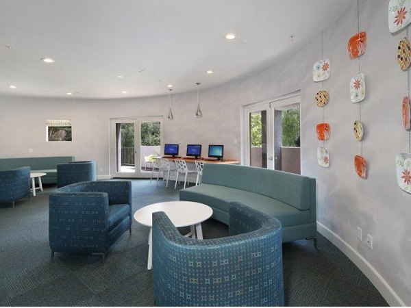 Clubhouse with modern furnishings at Canyon Crest Apartments, a luxury community offering exclusive amenities and stylish living spaces