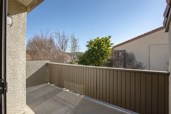 Spacious patio with seating area at Canyon Ridge Apartments