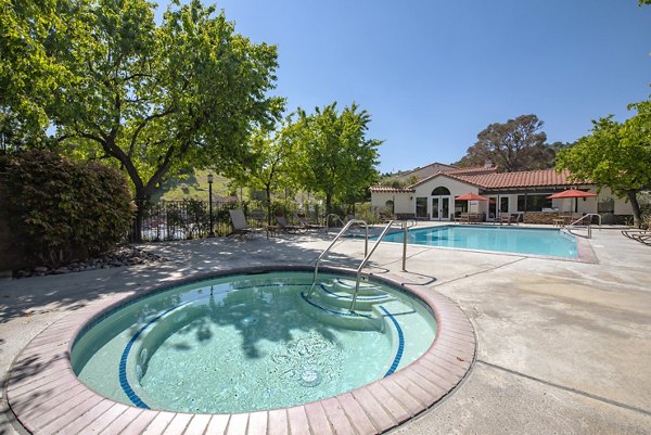 Relaxing hot tub at Canyon Ridge Apartments, perfect for unwinding and enjoying leisure time in a luxurious setting