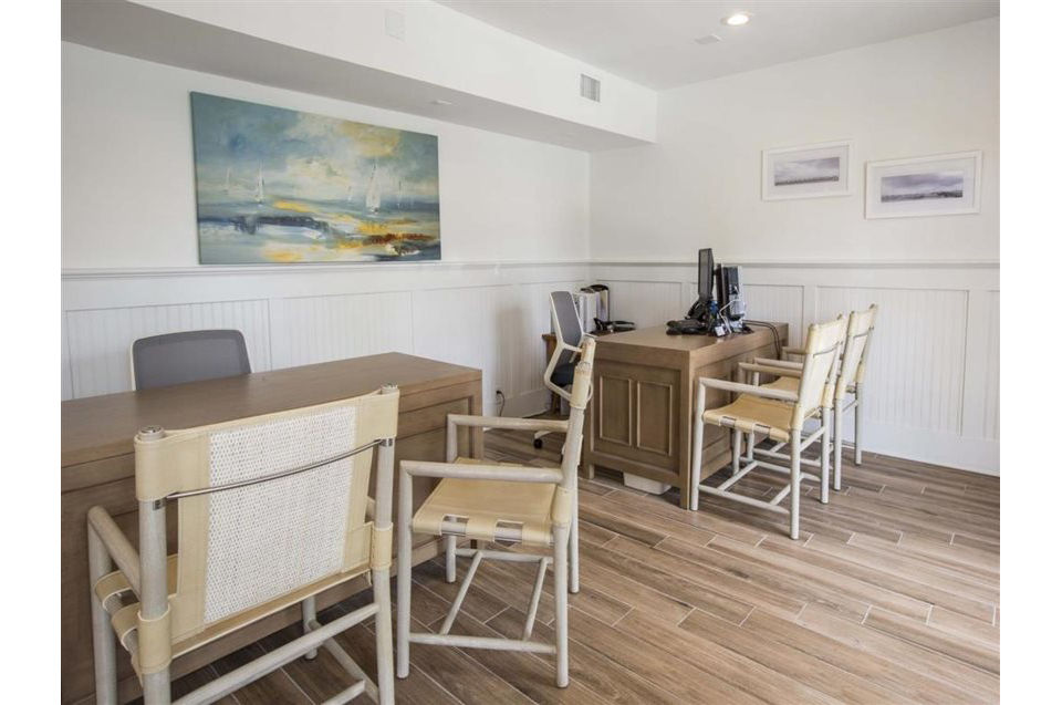 Clubhouse with modern design and lounge seating at Harborview Apartments, offering a luxurious community space for residents