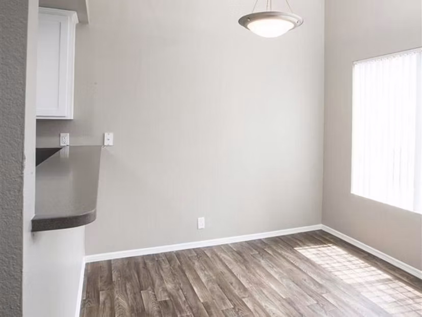 Dining area with modern furnishings at Harborview Apartments, offering a stylish space for residents to enjoy meals and entertain guests